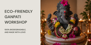Promotional graphic for an eco-friendly Ganpati workshop, featuring a biodegradable dark gray stone Ganesha statue adorned with colorful flower garlands and a pink flower on its head, set against a warm background with lit candles. The left side has a beige panel with the text 'ECO-FRIENDLY GANPATI WORKSHOP' and '100% BIODEGRADABLE, AND MADE WITH LOVE!'.